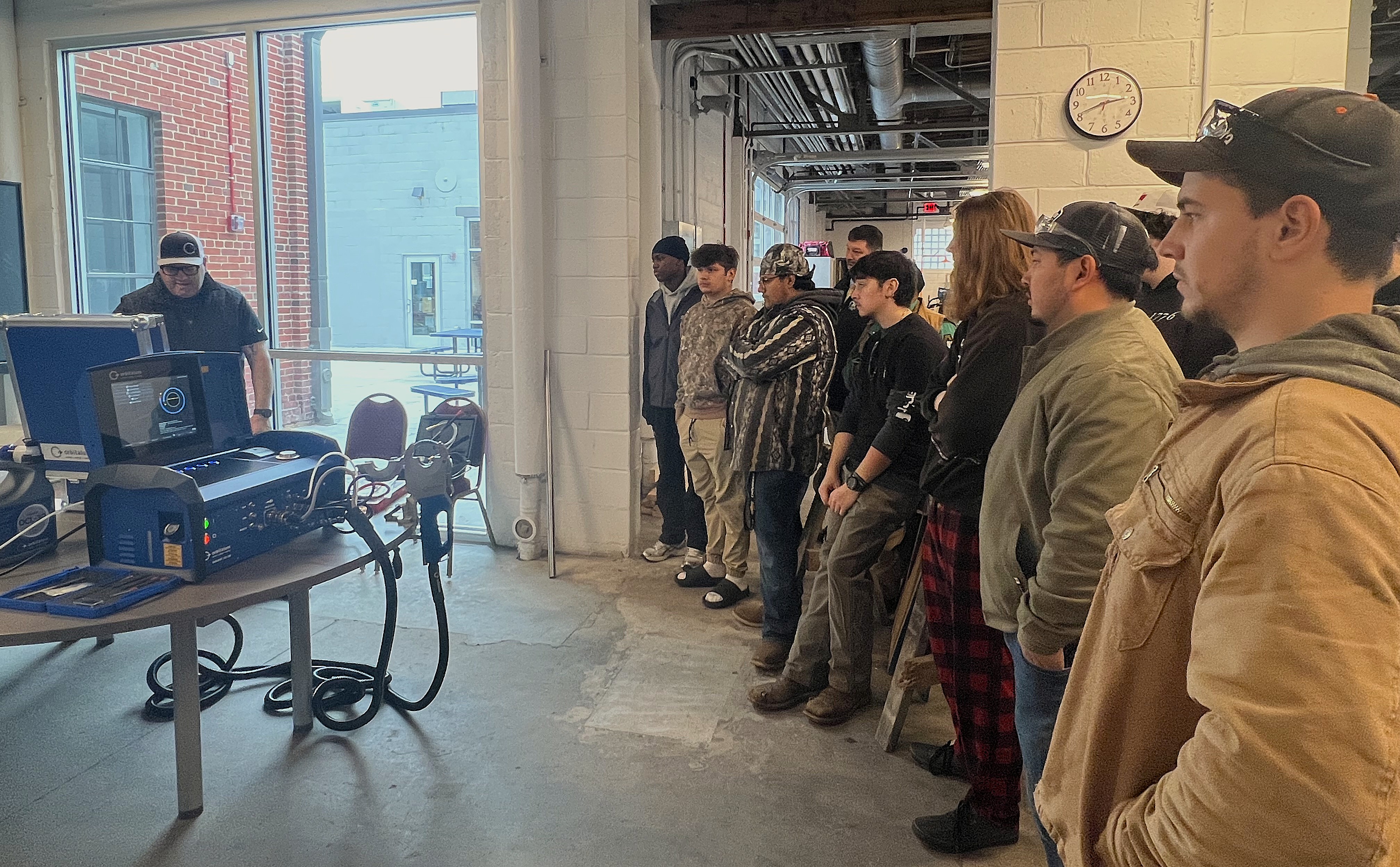 Picture of MGCC students watching welding demonstration