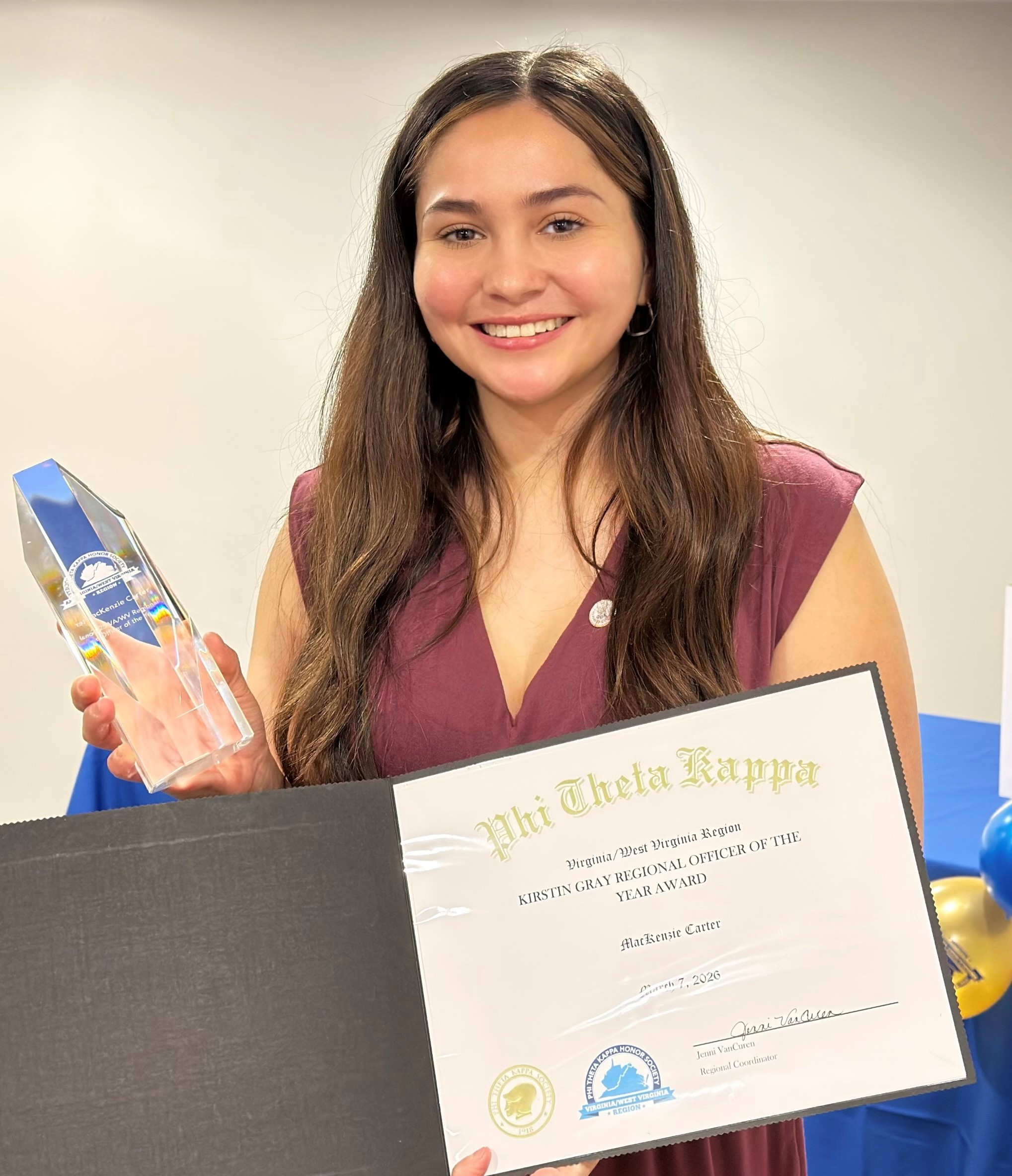 MGCC student MacKenzie Carter after receiving the Regional Officer of the Year award from the Phi Theta Kappa Honor Society