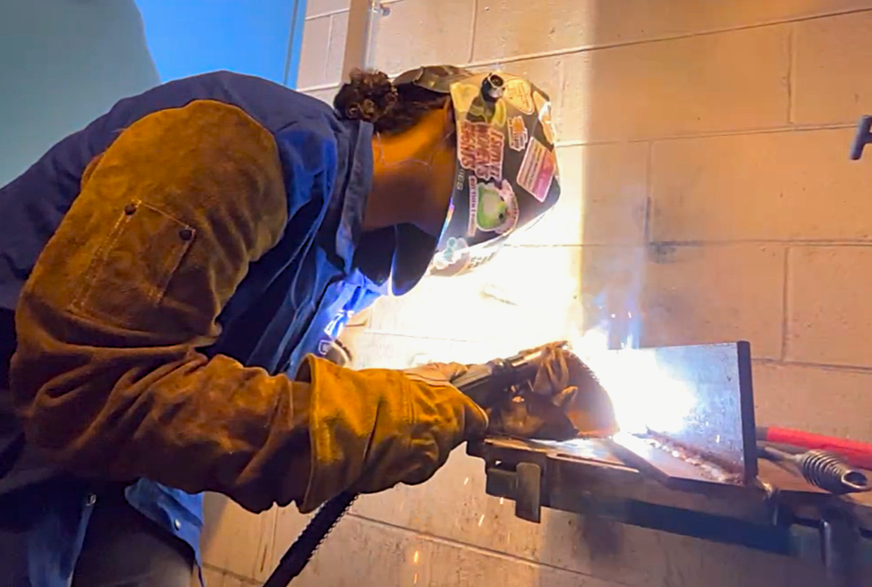 MGCC welding student Sarah Brown works on a project